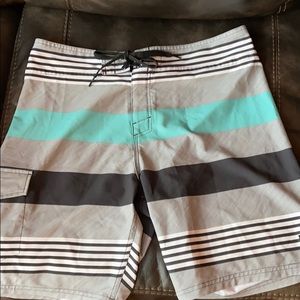 RUSTY BOARD SHORTS SIZE 34